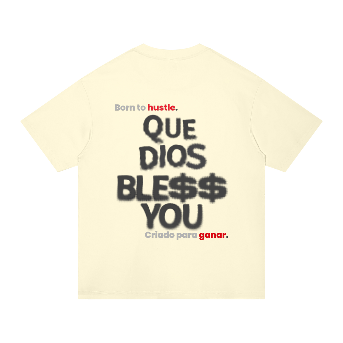 A pale cream-colored t-shirt shown from the back, featuring a Spanish graphic print that reads 'Born to hustle. QUE DIOS BLESS$ YOU / Criado para ganar.