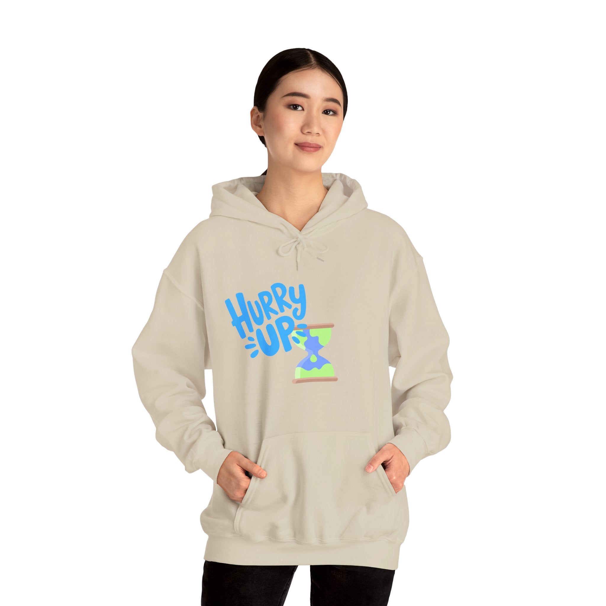 Person wearing a beige hoodie with 'Hurry Up' text design on a white background