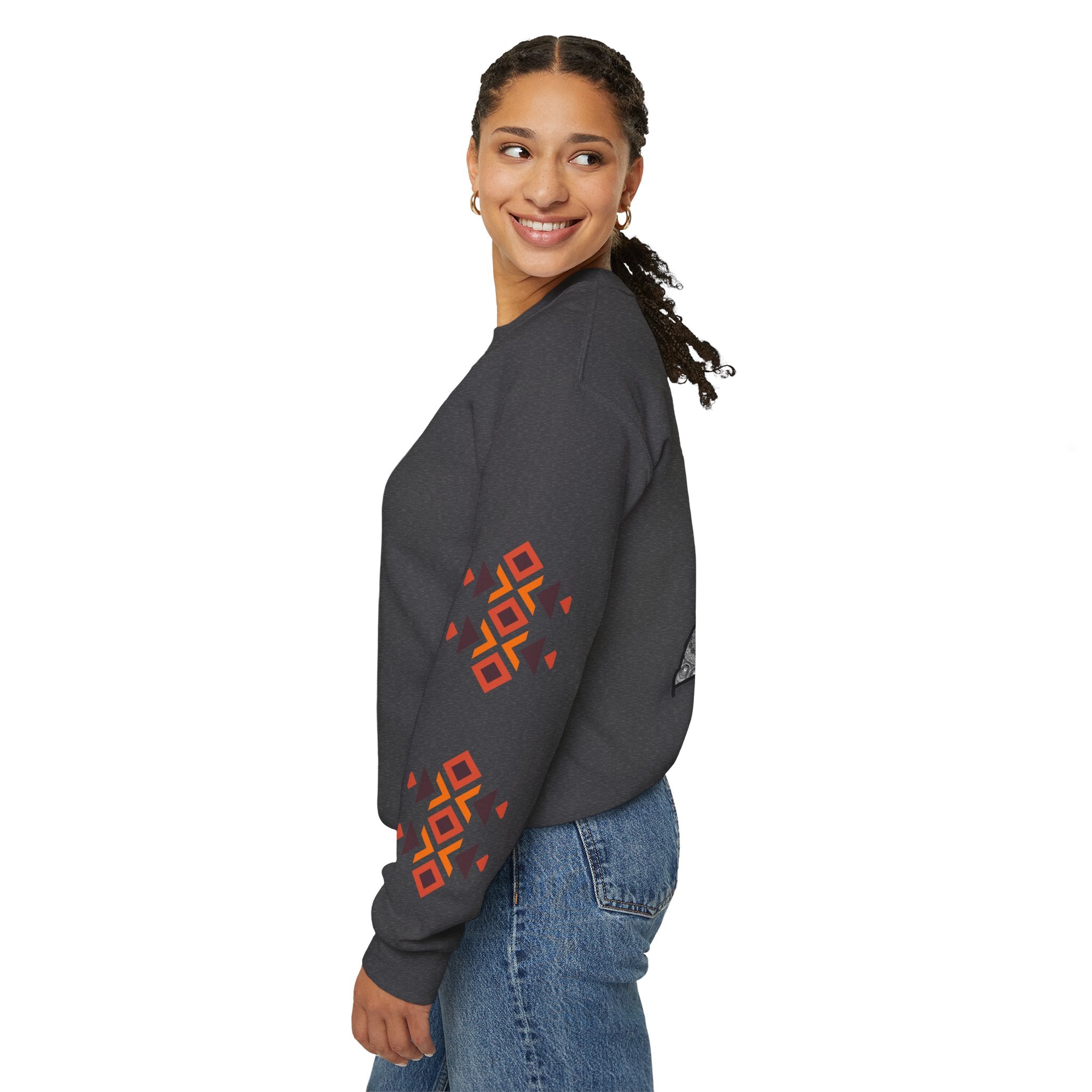 Woman wearing a dark gray sweatshirt with red geometric patterns on a white background