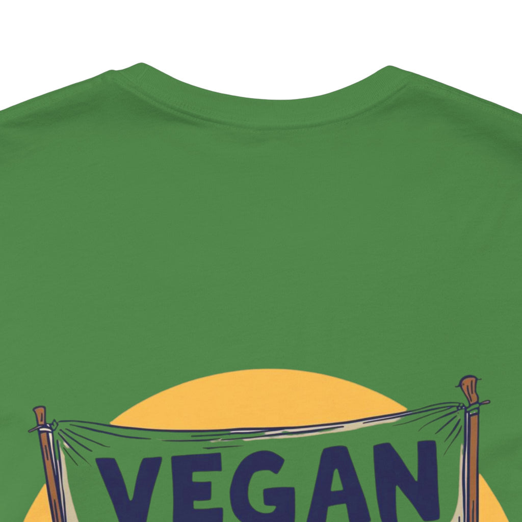 Green t-shirt with a yellow circle and 'VEGAN' banner design on a white background