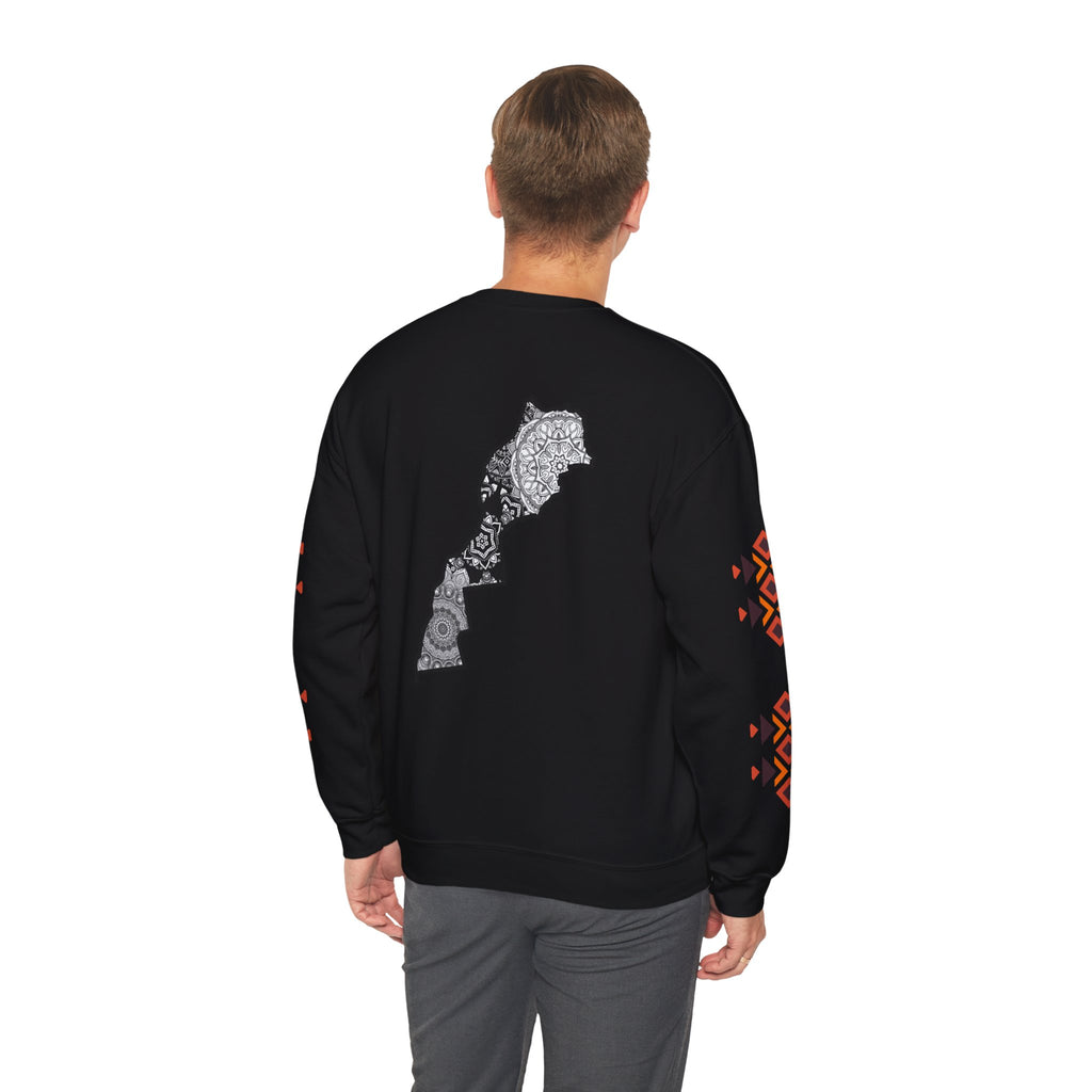 Person wearing a black sweatshirt with a design on the back, standing against a white background