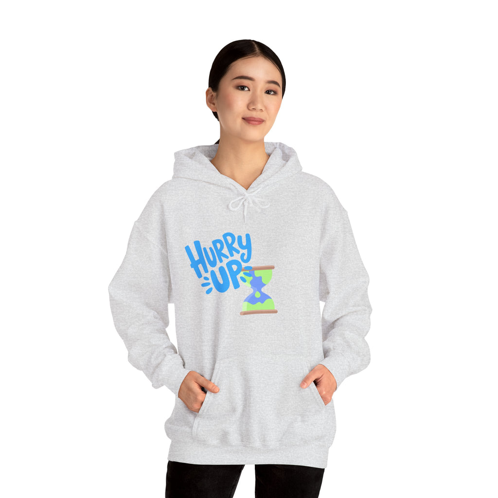 Person wearing a gray hoodie with 'Hurry Up' text design on a white background