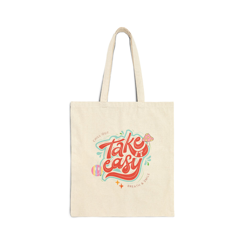 Beige tote bag with colorful 'Take Easy' design on a white background