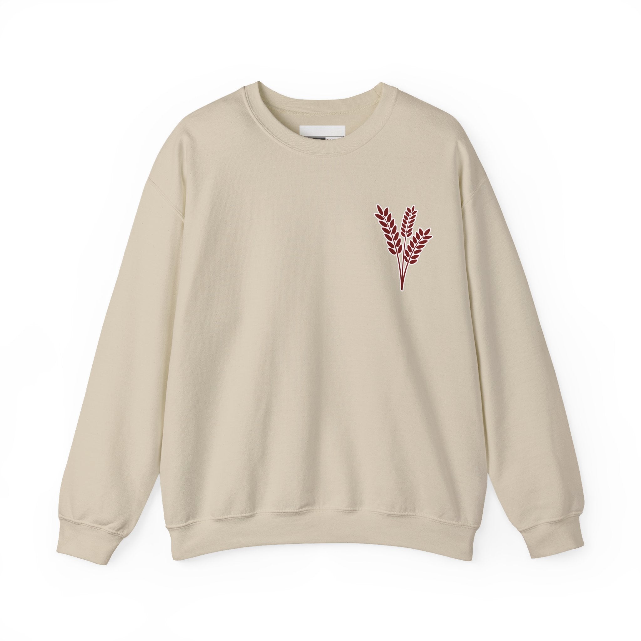 Beige sweatshirt with red leaf design on a white background