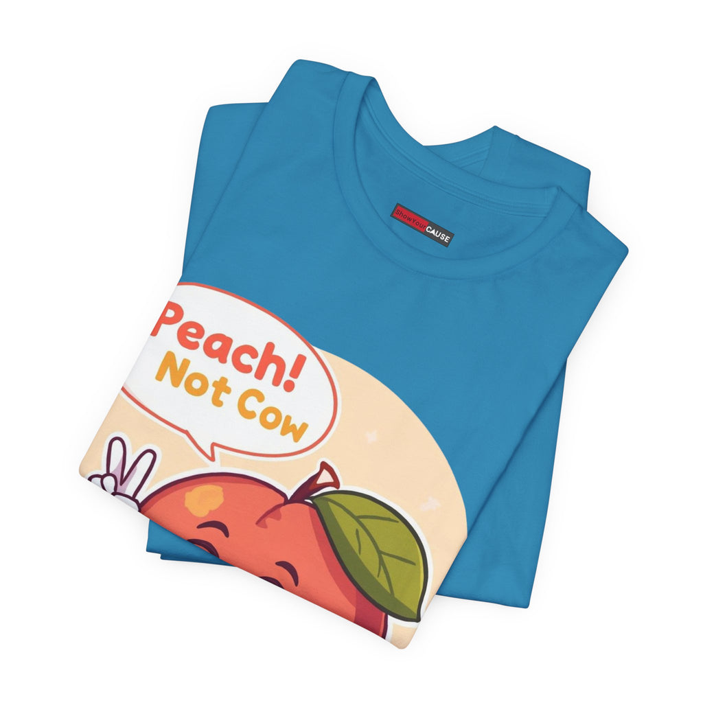 Blue t-shirt with a colorful graphic and text 'Peach! Not Cow' on a white background