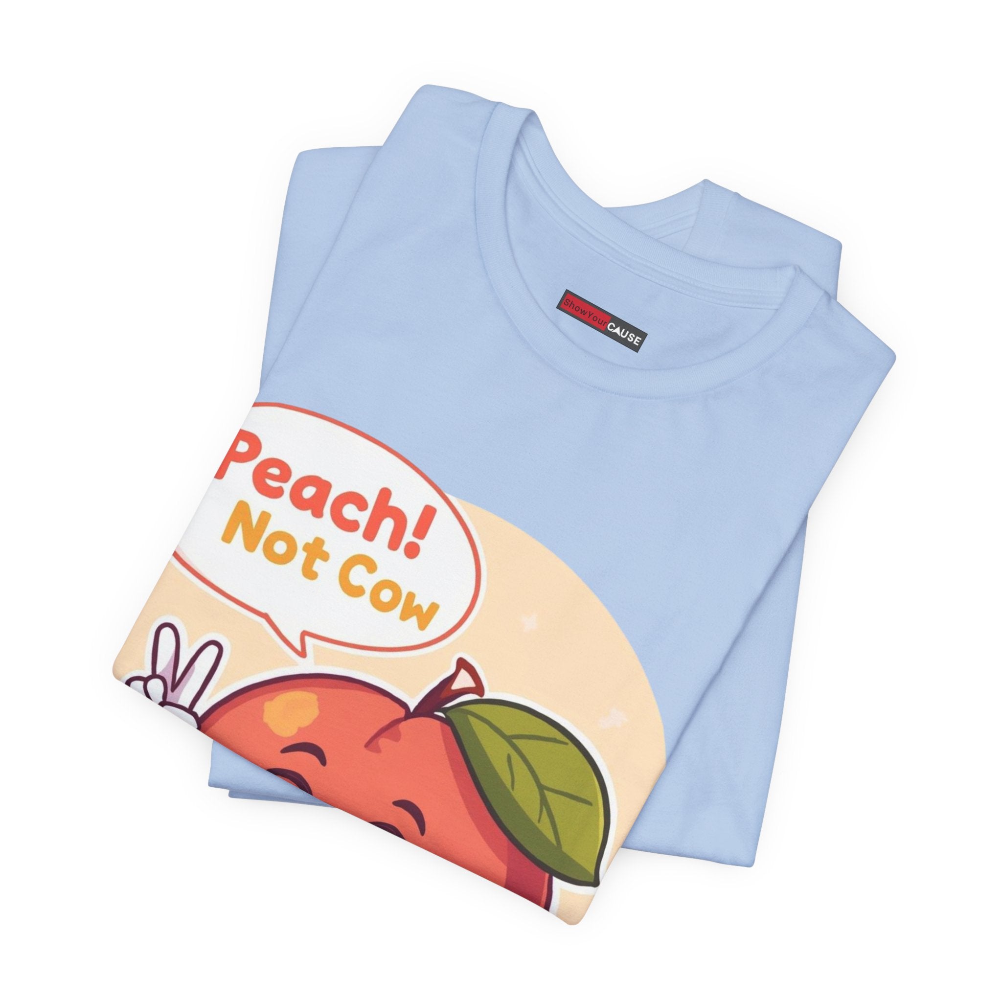 Folded light blue t-shirt with a colorful graphic and text on a white background