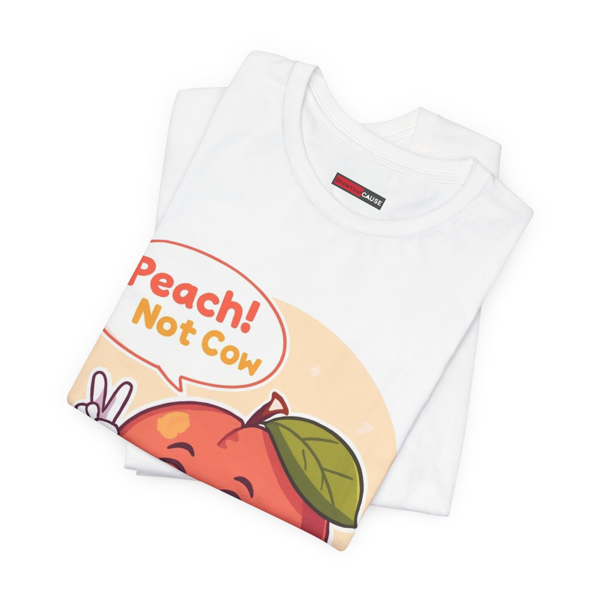 White t-shirt with a colorful graphic of a peach and text 'Peach! Not Cow' on a white background.
