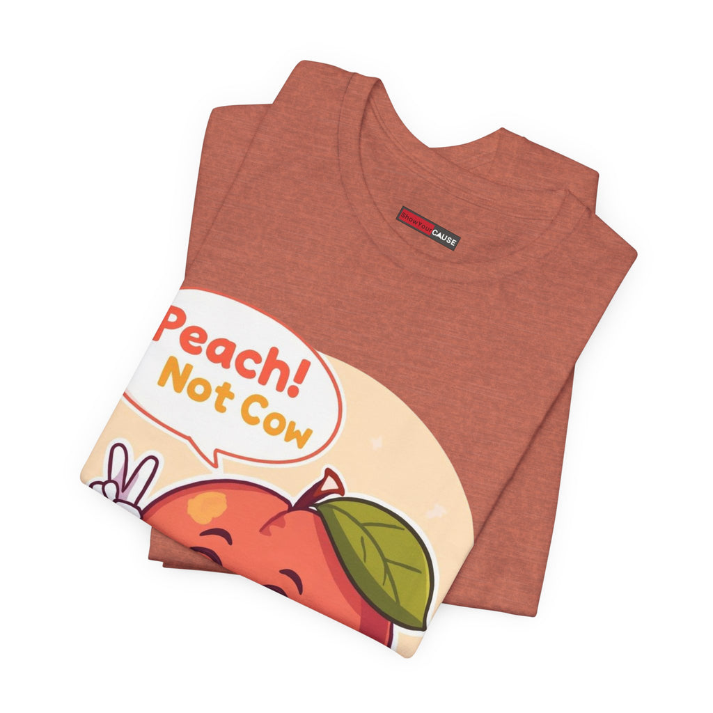 Folded brown t-shirt with a colorful graphic and text on a white background