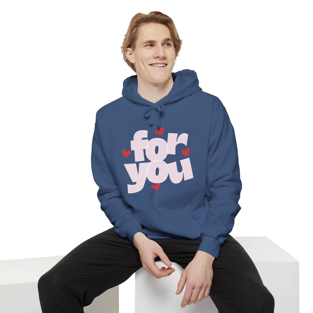 Person wearing a blue hoodie with 'For You' text and hearts on a white background