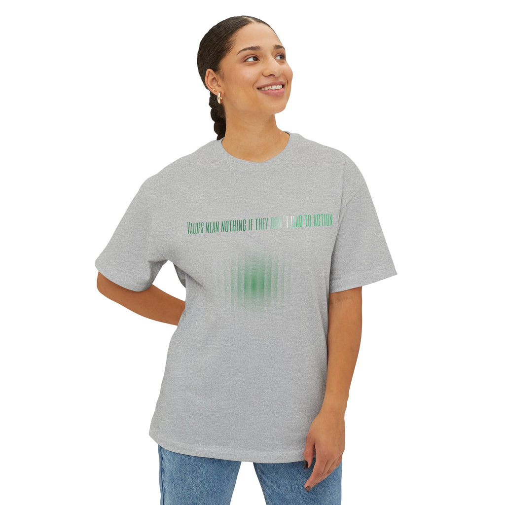 Person wearing a gray t-shirt with green text on a white background