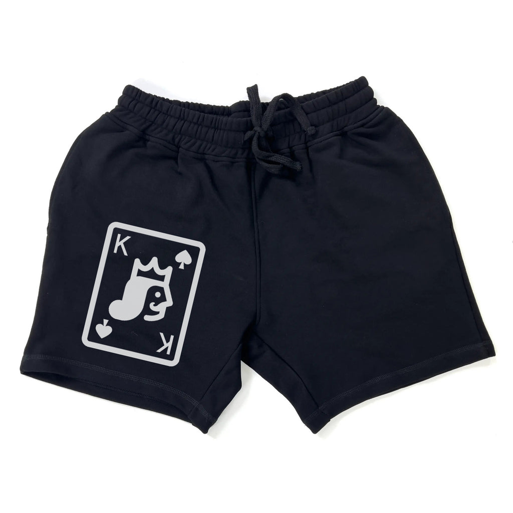 Black shorts with a white graphic design on a white background.
Black shorts, King of Spades playing card graphic, musical note with crown face design, ShowYourIdentity collection, bold streetwear, artistic fashion, music and royalty theme, unique urban apparel.
- “Melek dyal music.”
- “Spades w crown, identity strong.”
- “ShowYourIdentity, show your vibe.”
- “Music hiya lpower dyalek.”
