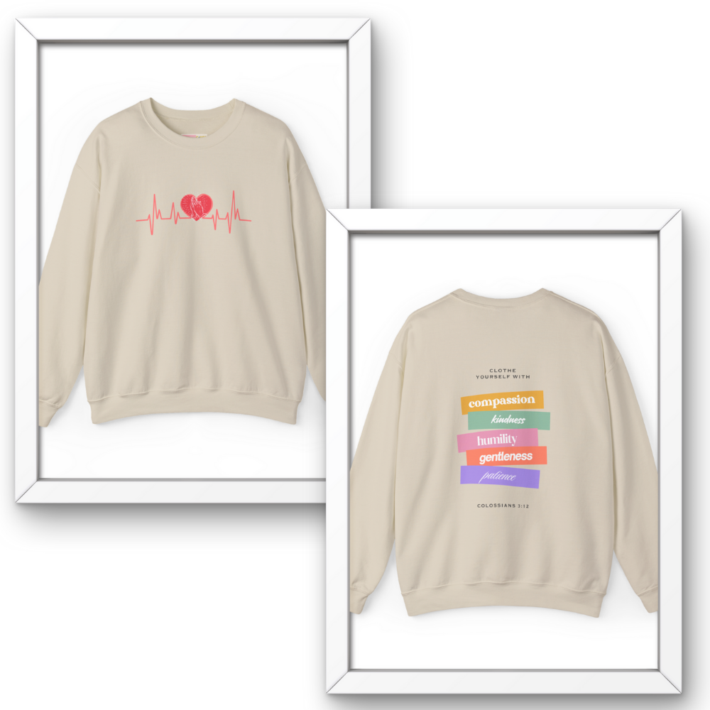 Beige sweatshirt with heart design and motivational phrases on a white background
