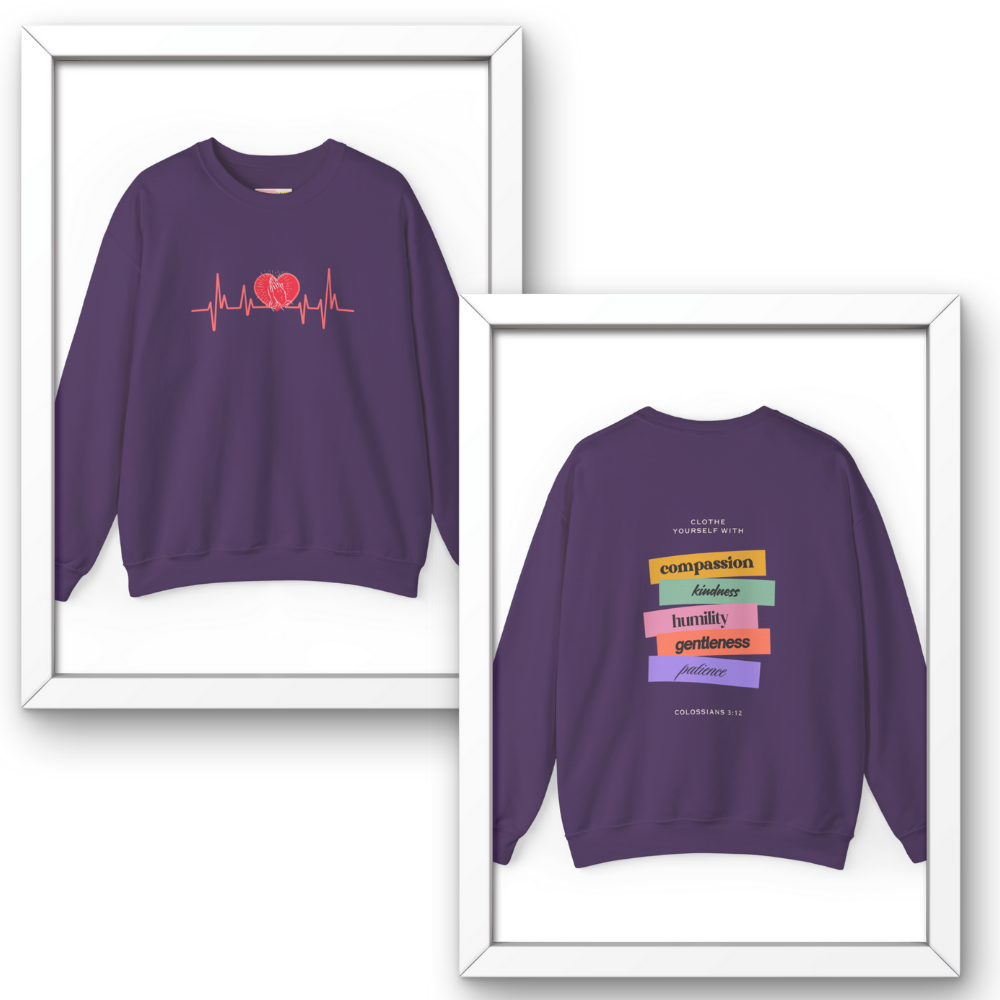 Purple sweatshirt with heart and text design on a white background