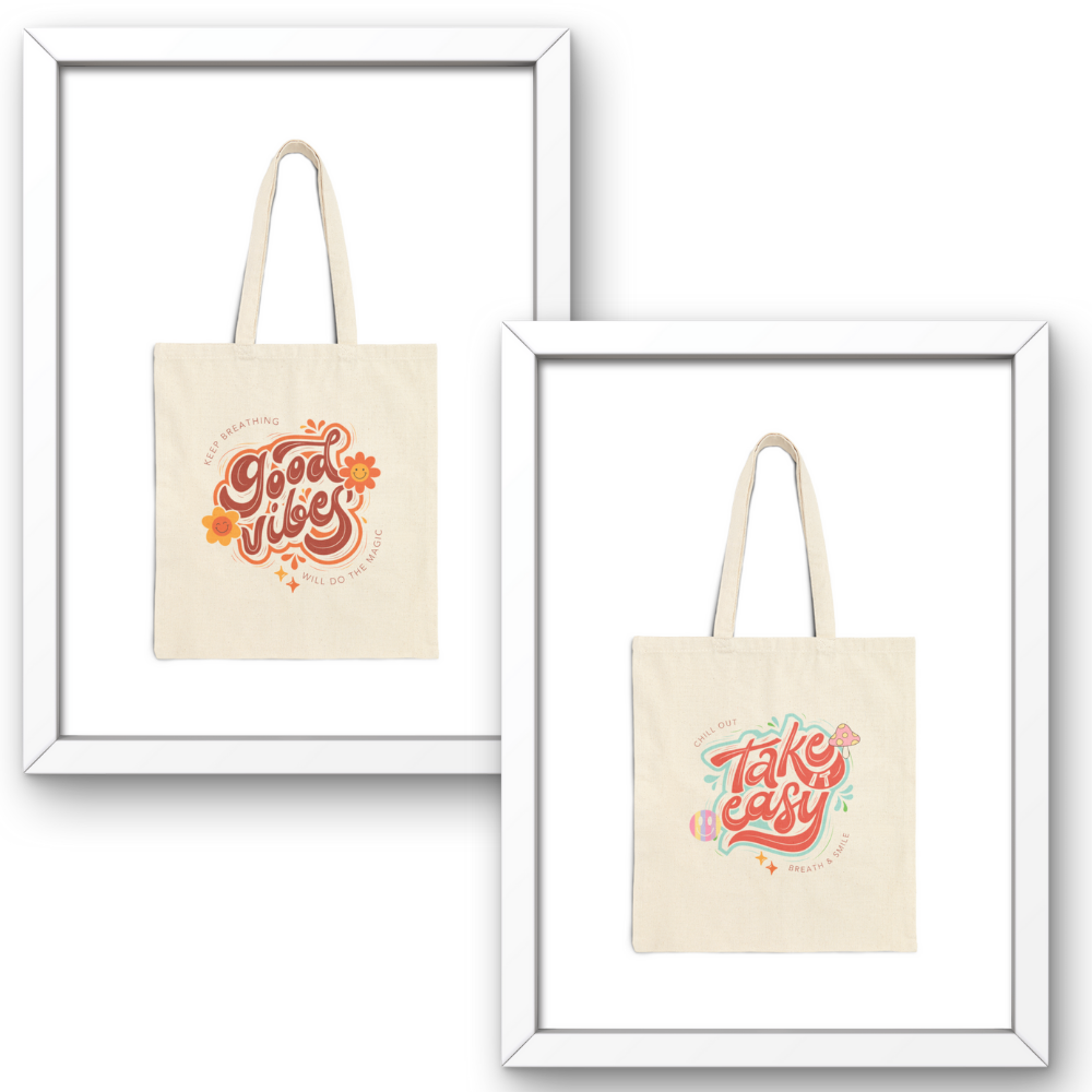 Two tote bags with motivational phrases in frames on a white background