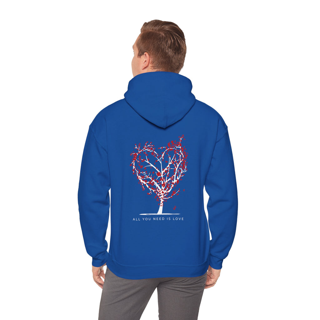 Person wearing a blue hoodie with a heart design and text on the back