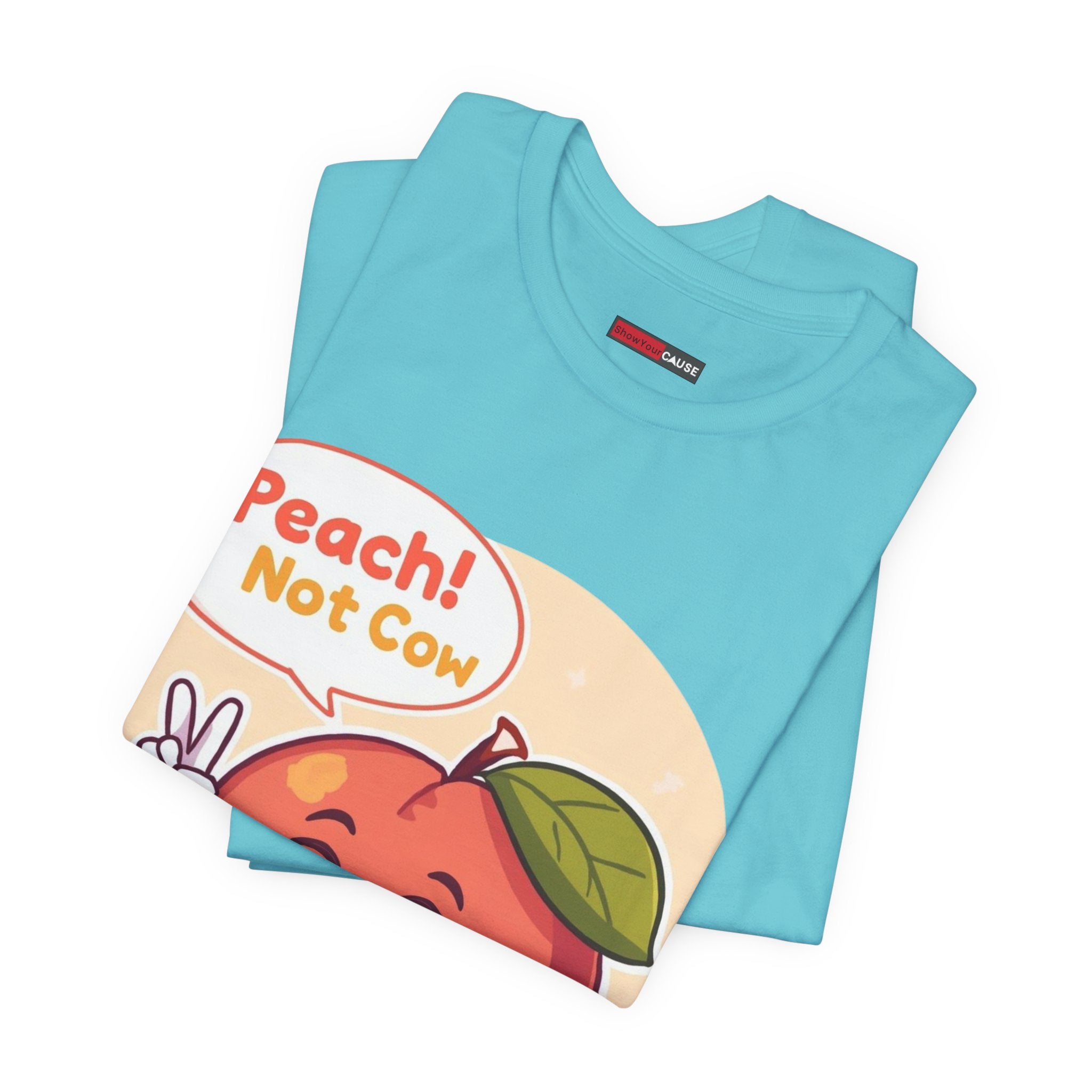 Folded blue t-shirt with a colorful graphic and text on a white background