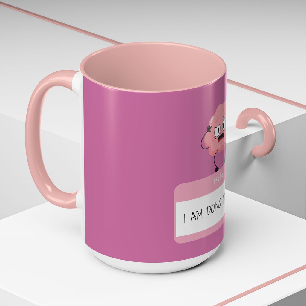 Pink mug with a cartoon character on a white surface