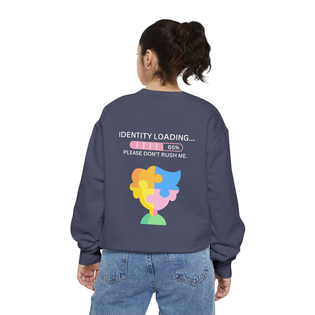 Person wearing a sweatshirt with a colorful design and text on the back