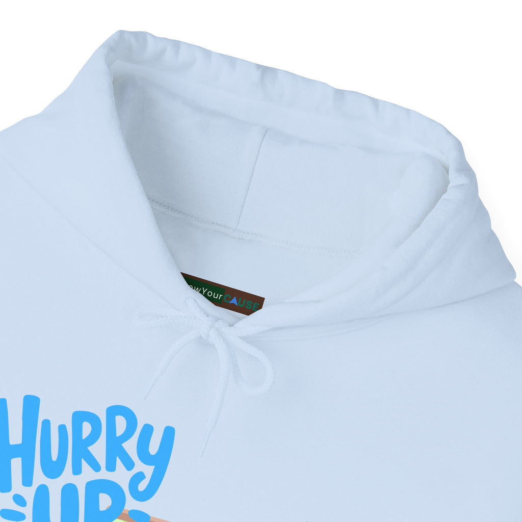 Light blue hoodie with 'Hurry Up' text and a brand label on a white background