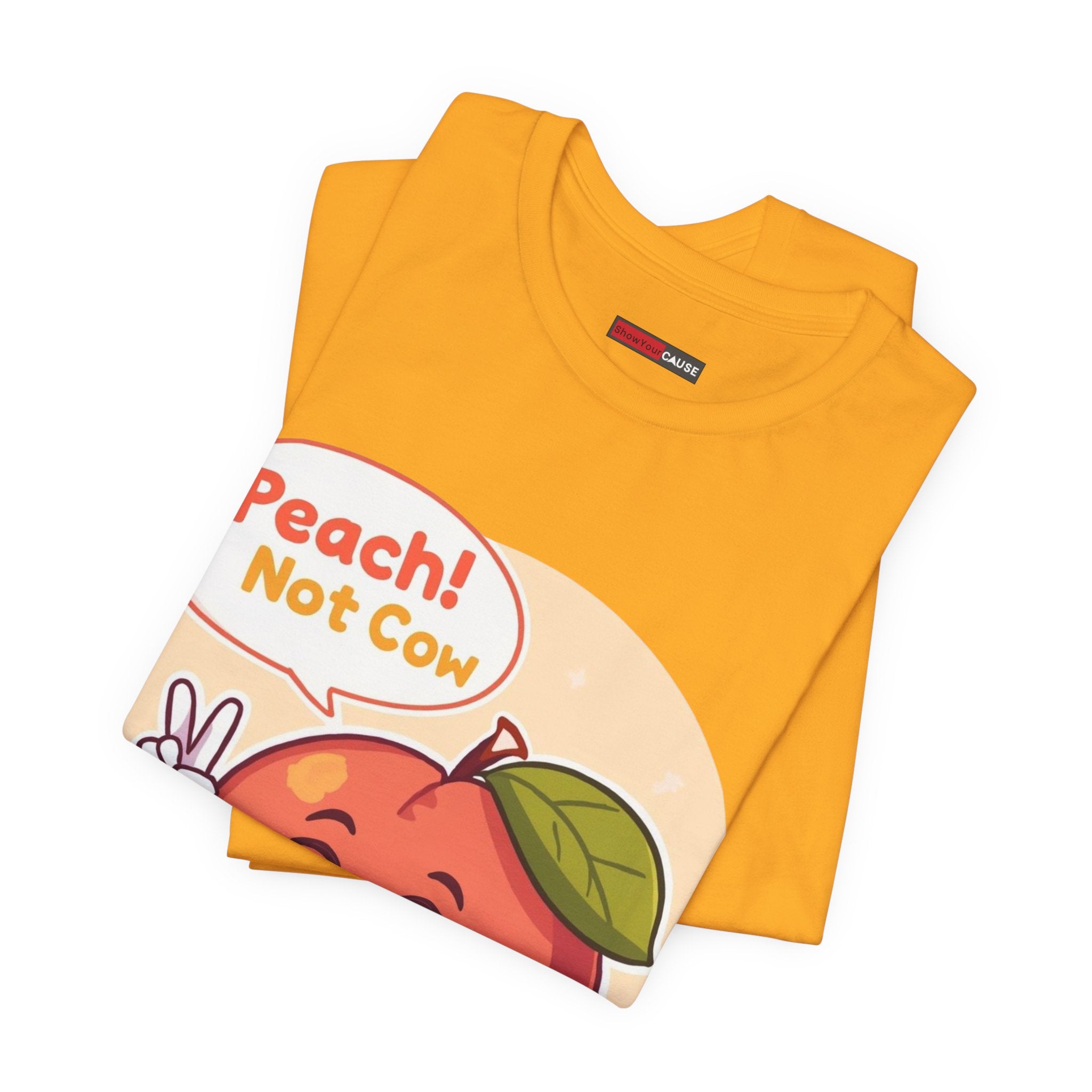 Folded yellow t-shirt with a peach graphic and text on a white background