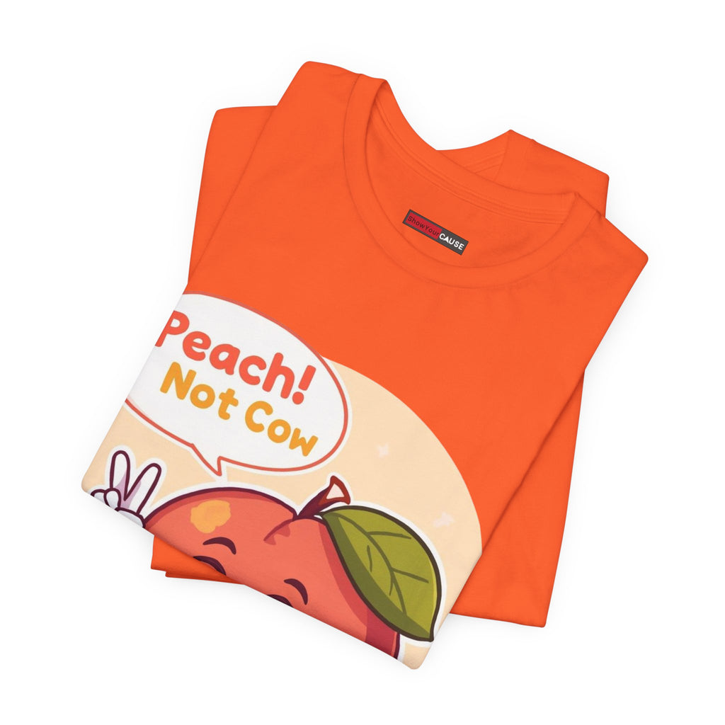 Orange t-shirt with a graphic design featuring a peach and text on a white background