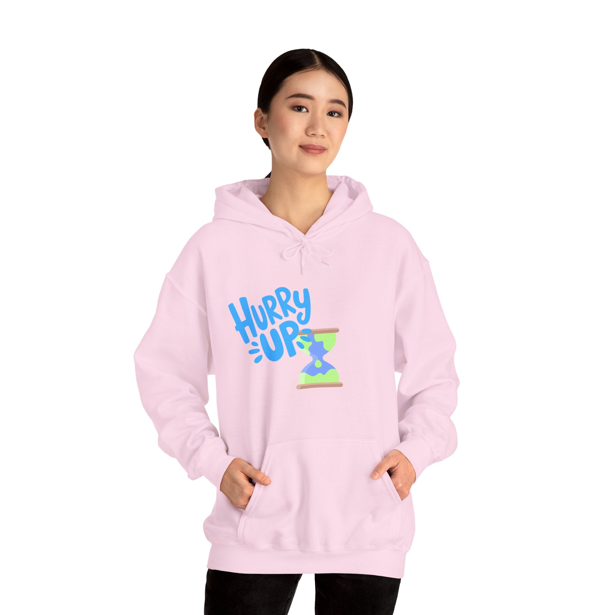 Person wearing a pink hoodie with 'Hurry Up' text and graphic on a white background