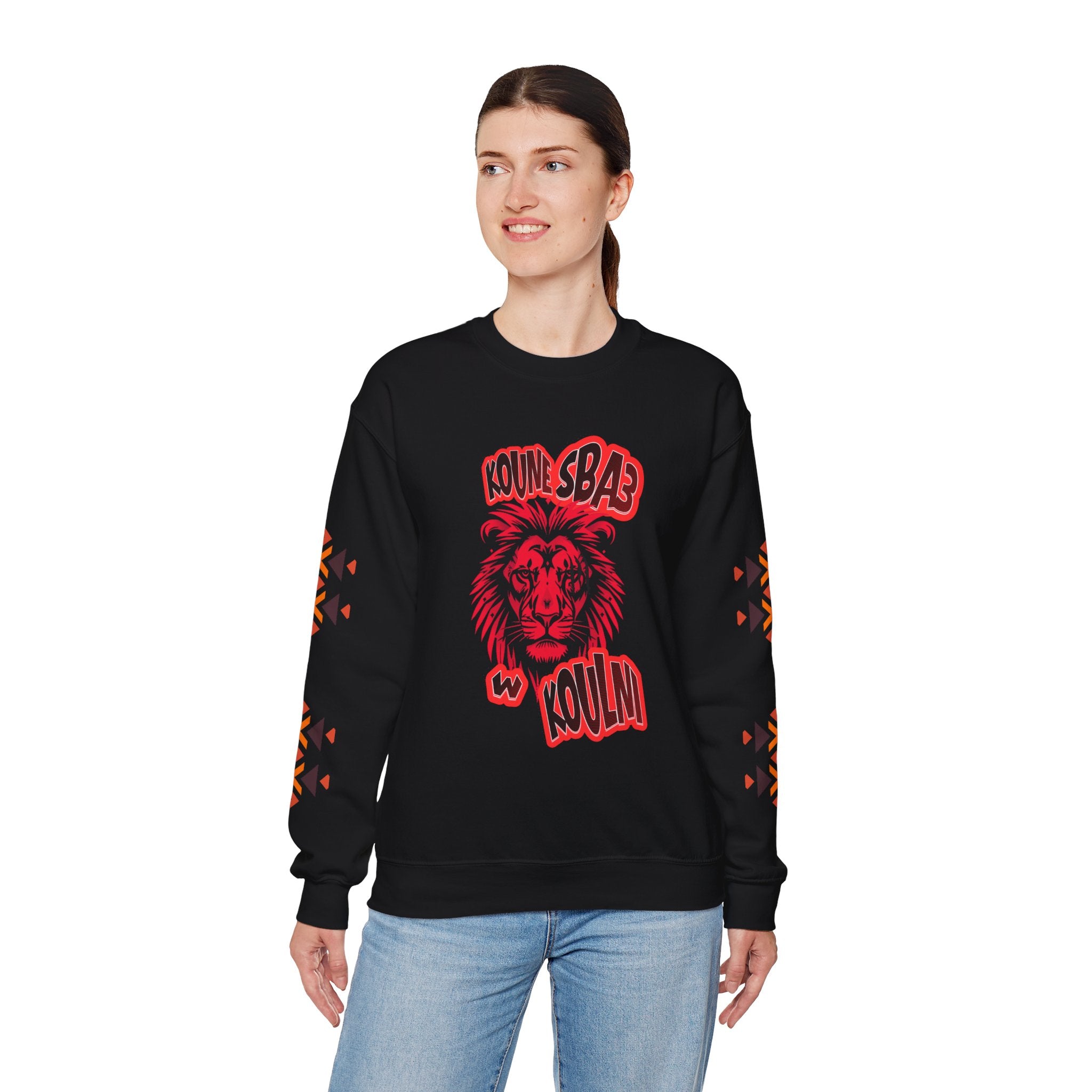 Person wearing a black sweatshirt with red lion graphic and text on a white background