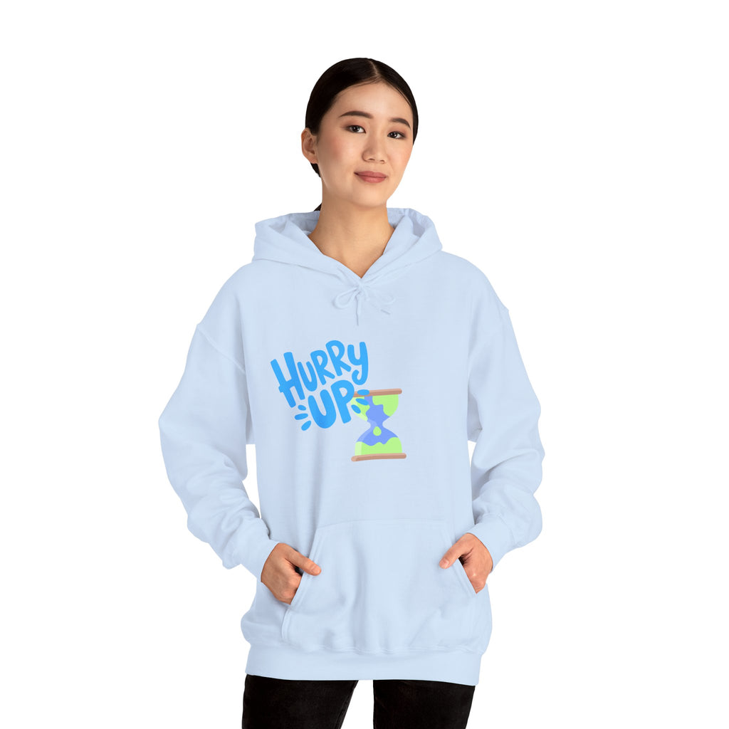 Light blue hoodie with 'Hurry Up' graphic worn by a person on a white background