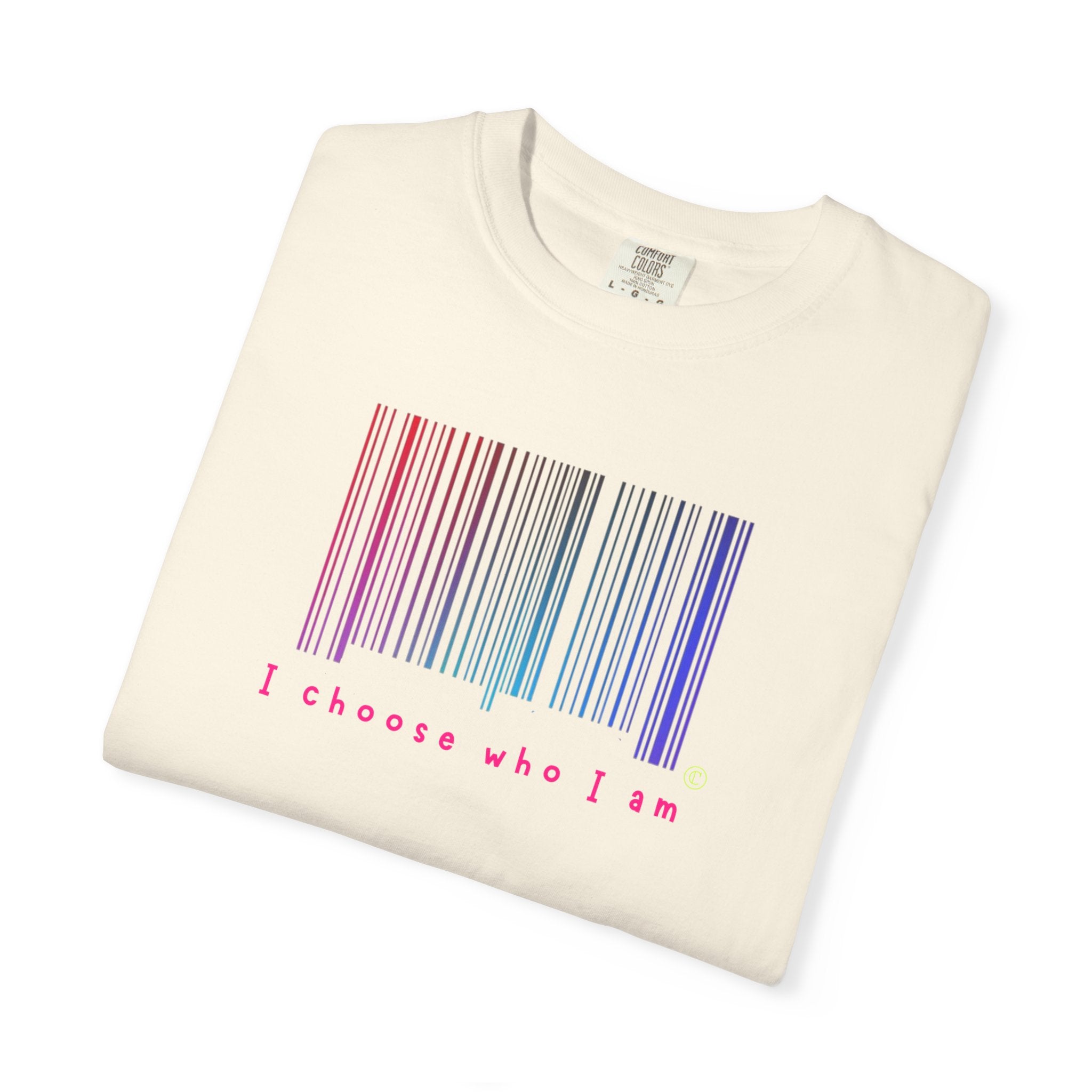 Folded cream-colored t-shirt with a rainbow barcode and 'I choose who I am' text on a white background