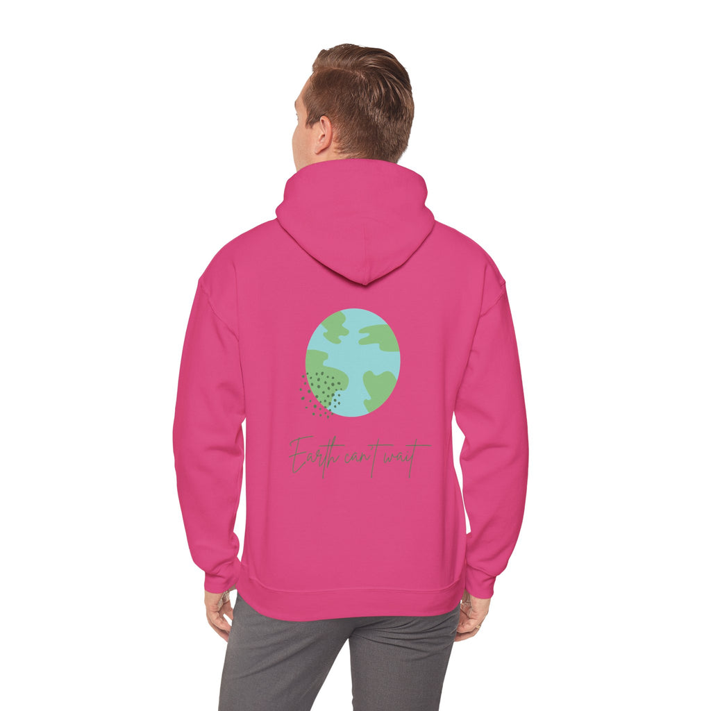 Person wearing a pink hoodie with a green and blue design on the back, on a white background