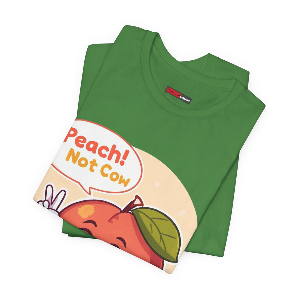 Green t-shirt with a colorful graphic and text 'Peach! Not Cow' on a white background