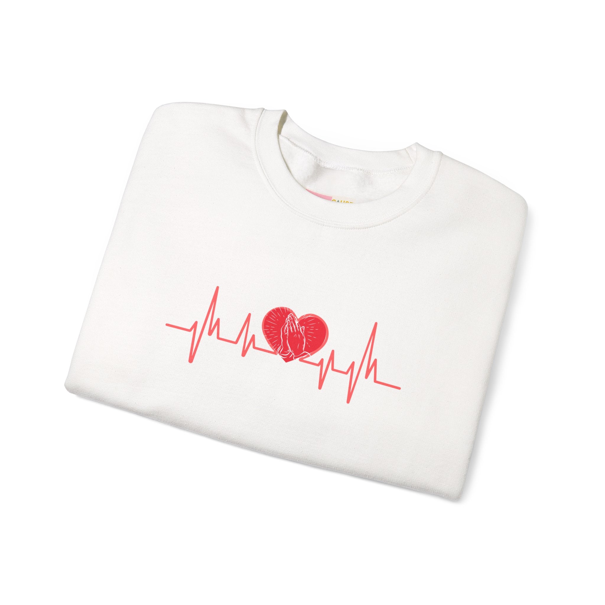 White sweatshirt with red heart and heartbeat line design on a white background