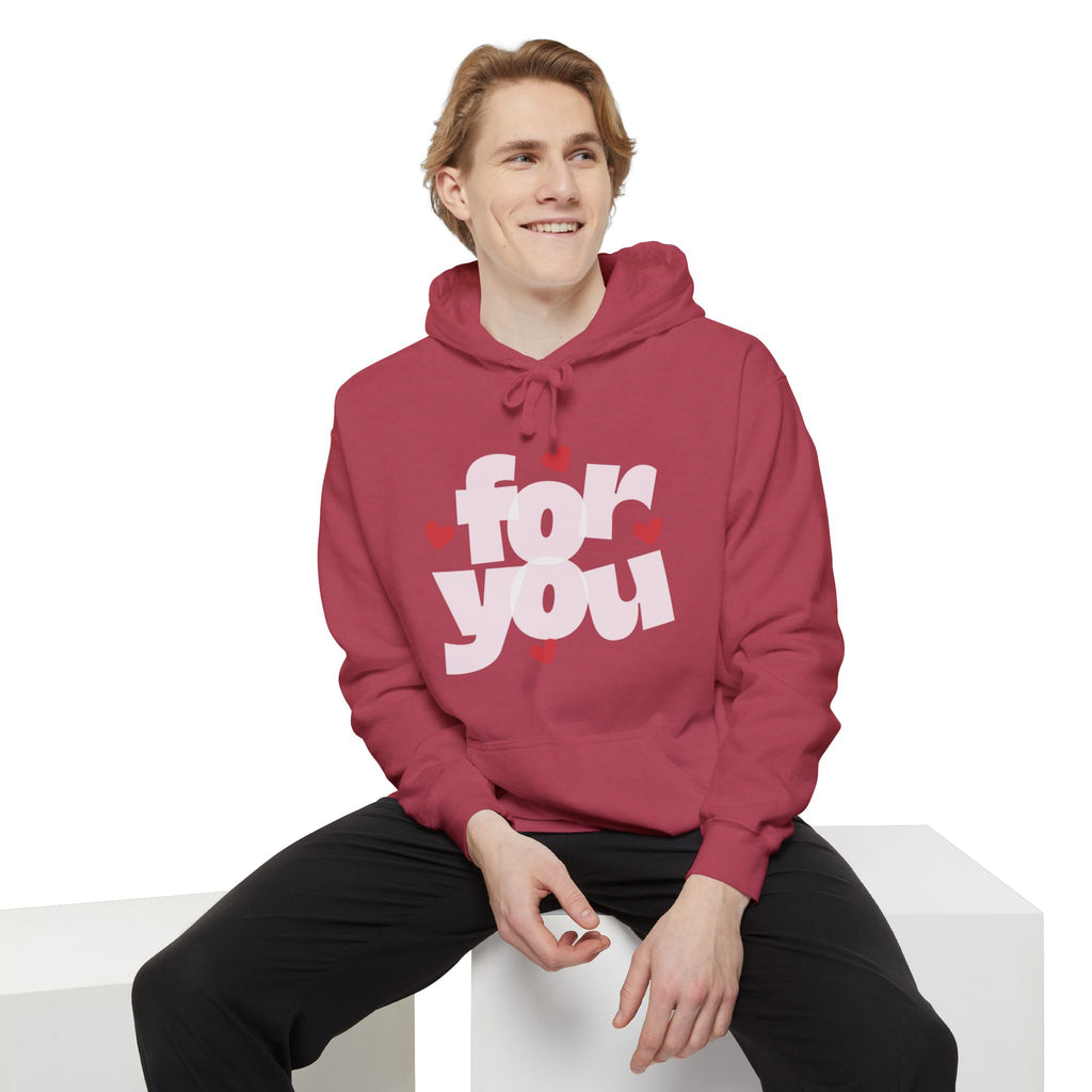 Person wearing a red hoodie with 'for you' text on a white background