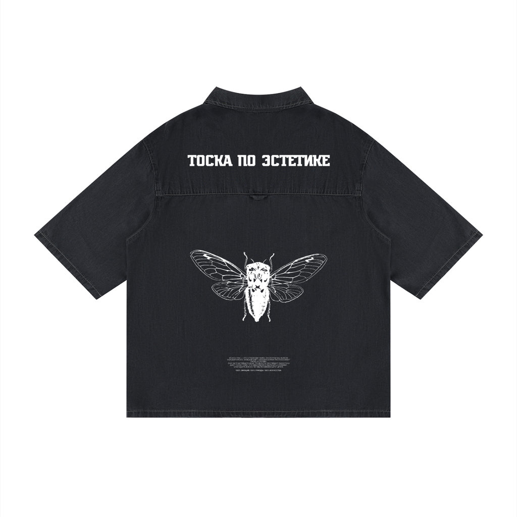 A black short-sleeve button-up shirt shown from the back, featuring a white graphic of a cicada in the center and white Cyrillic text above it, displayed on a solid white background.