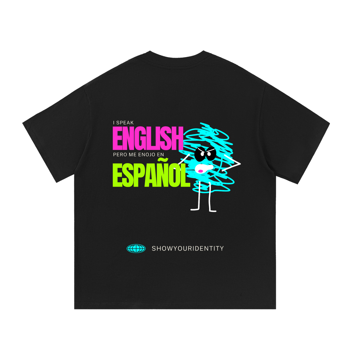 A black short-sleeve t-shirt shown flat against a white background, featuring a colorful graphic on the front with the text 'I SPEAK ENGLISH PERO ME ENJOY EN ESPAÁOL' and a cartoon character made of scribbled lines. The brand name 'SHOWYOURIDENTITY' is printed below the graphic.