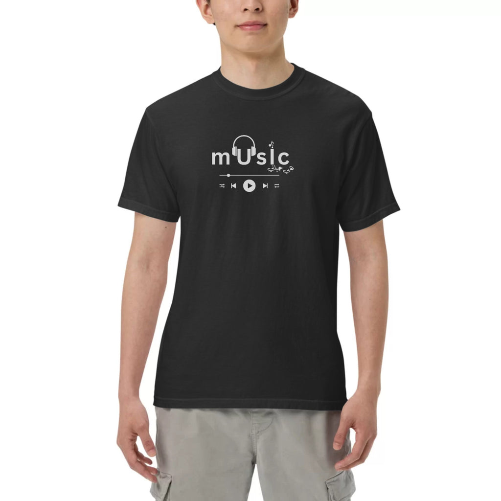 Person wearing a black t-shirt with 'music' design on a white background