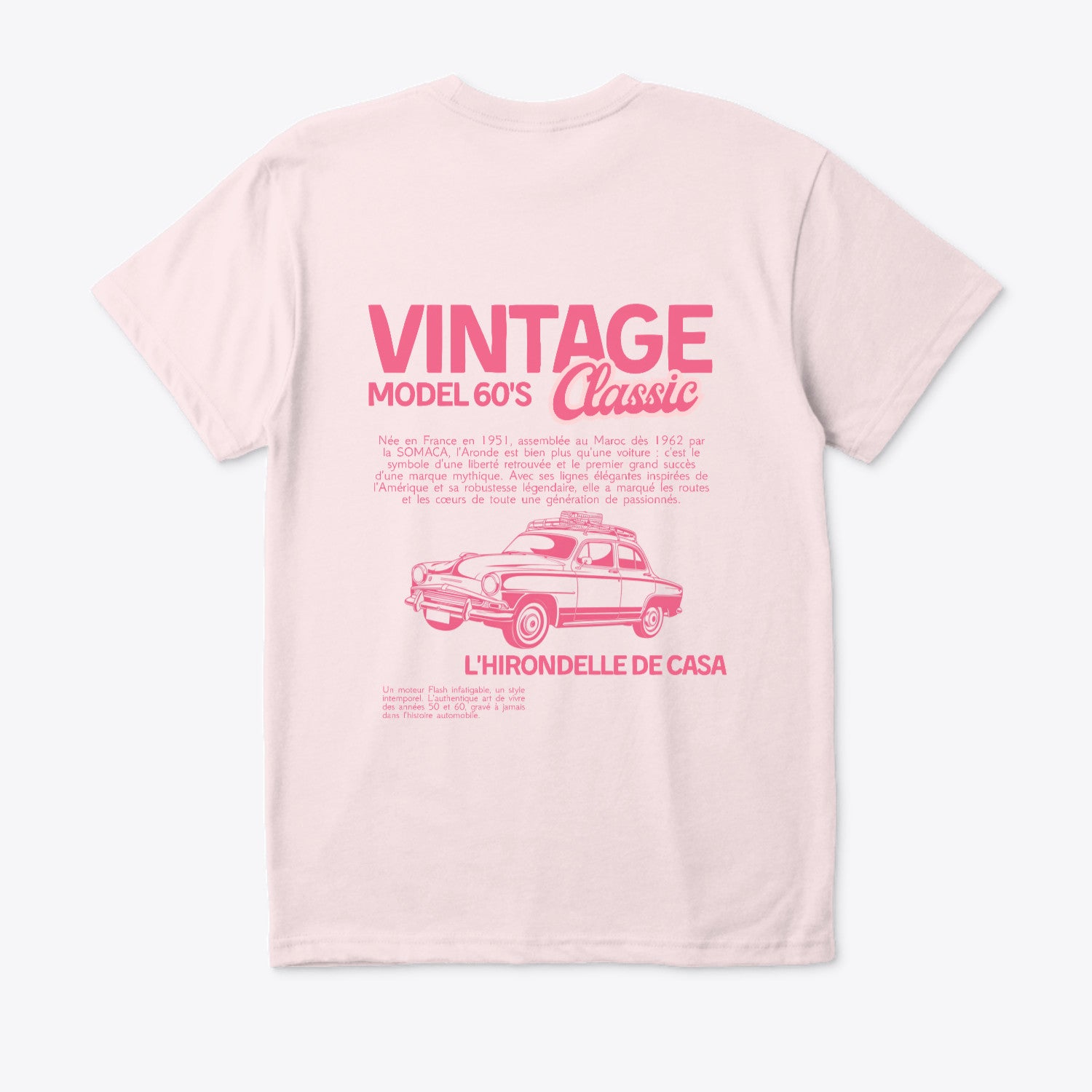 Pink t-shirt with vintage car design and text on a white background