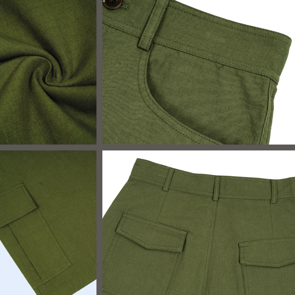 Close-up of green pants with a button on a white background
Olive green cargo shorts, Aquaholic text white, compass rose graphic nautical design, ShowYourNature collection, eco-friendly streetwear, outdoor adventure fashion, water-inspired apparel.
Unisex Woven Cargo Shorts