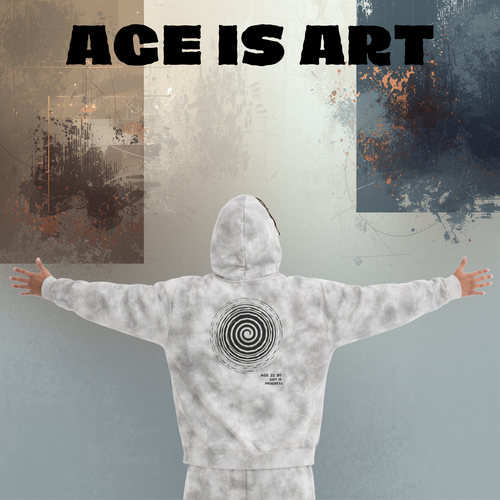 Person wearing a hoodie with a spiral design, standing against a textured wall with 'AGE IS ART' text.